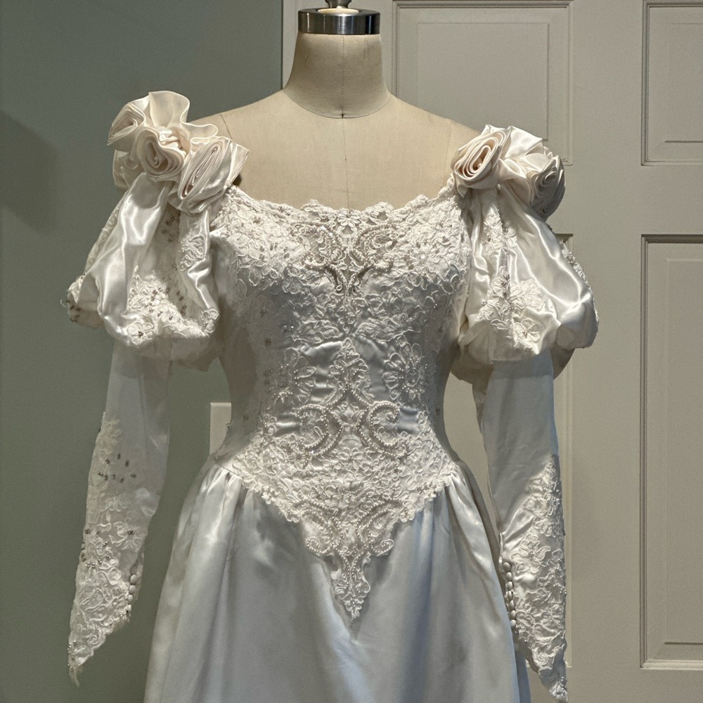 Elegant White Wedding Dress with Lace Details and long Train